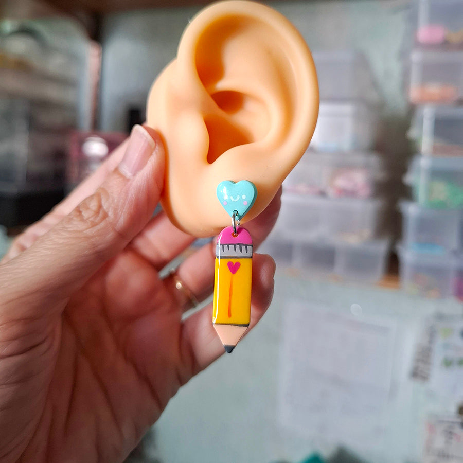 Aretes lápiz primaria