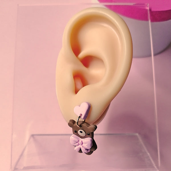 Aretes osos con moño rosa