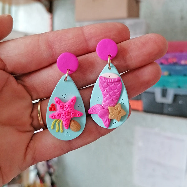 Aretes sirenas