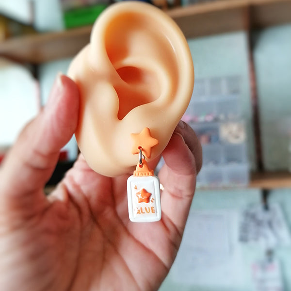 Aretes recortes del kinder naranjas