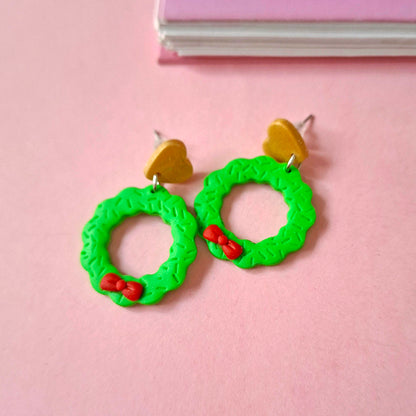 Aretes coronitas navideñas con moño