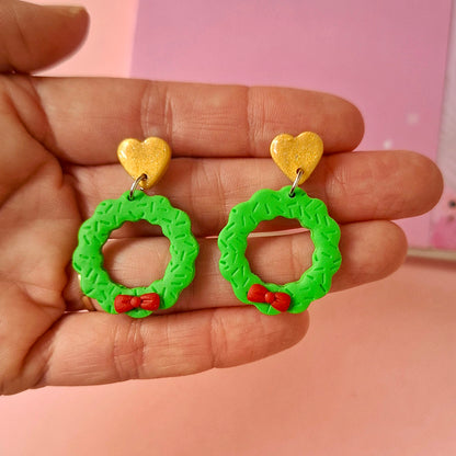 Aretes coronitas navideñas con moño