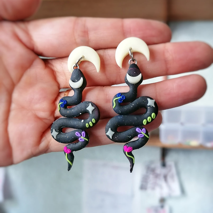 Aretes serpiente universo