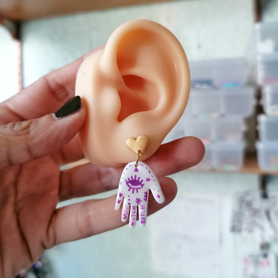 Aretes mano de la suerte