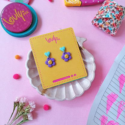 Aretes flores moradas