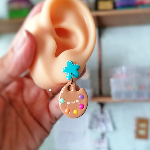 Aretes godete y pincel