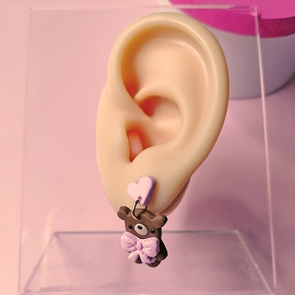 Aretes osos con moño rosa