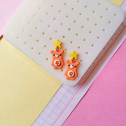 Aretes ositos largos naranjas