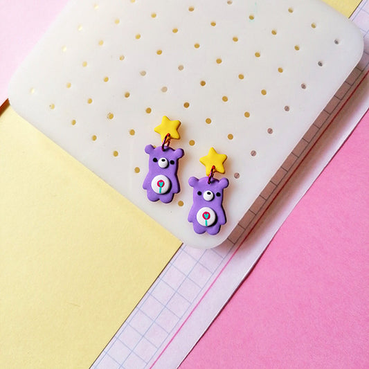 Aretes ositos largos morados