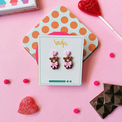 Aretes osos con moño rosa