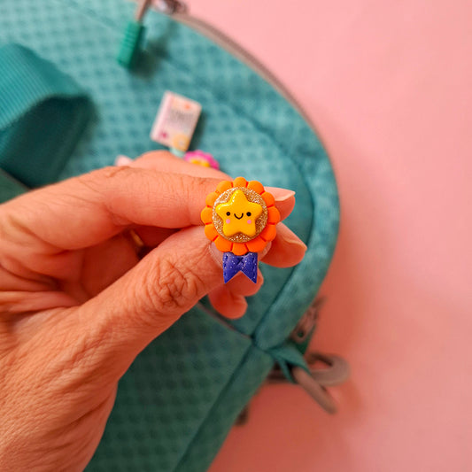Pin medalla naranja